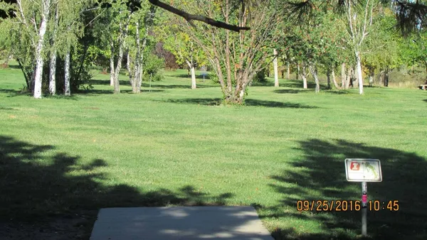 Energy Rotary Club Disc Golf Course: Hole 1 · Tee pad · Sep 2016, photo by jeff Balthazore